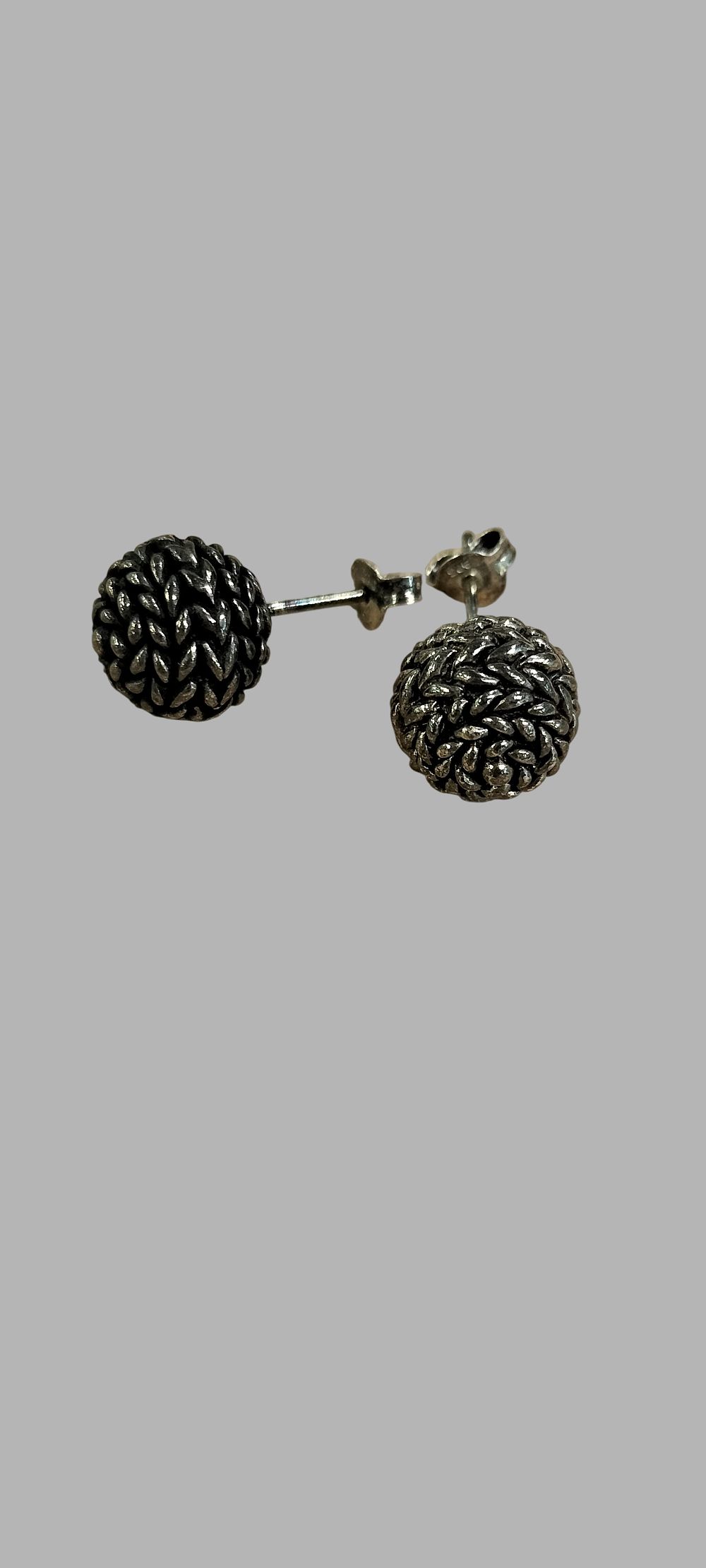 Lot 391: A Pair of Sterling Silver Woven Textured Stud Earrings