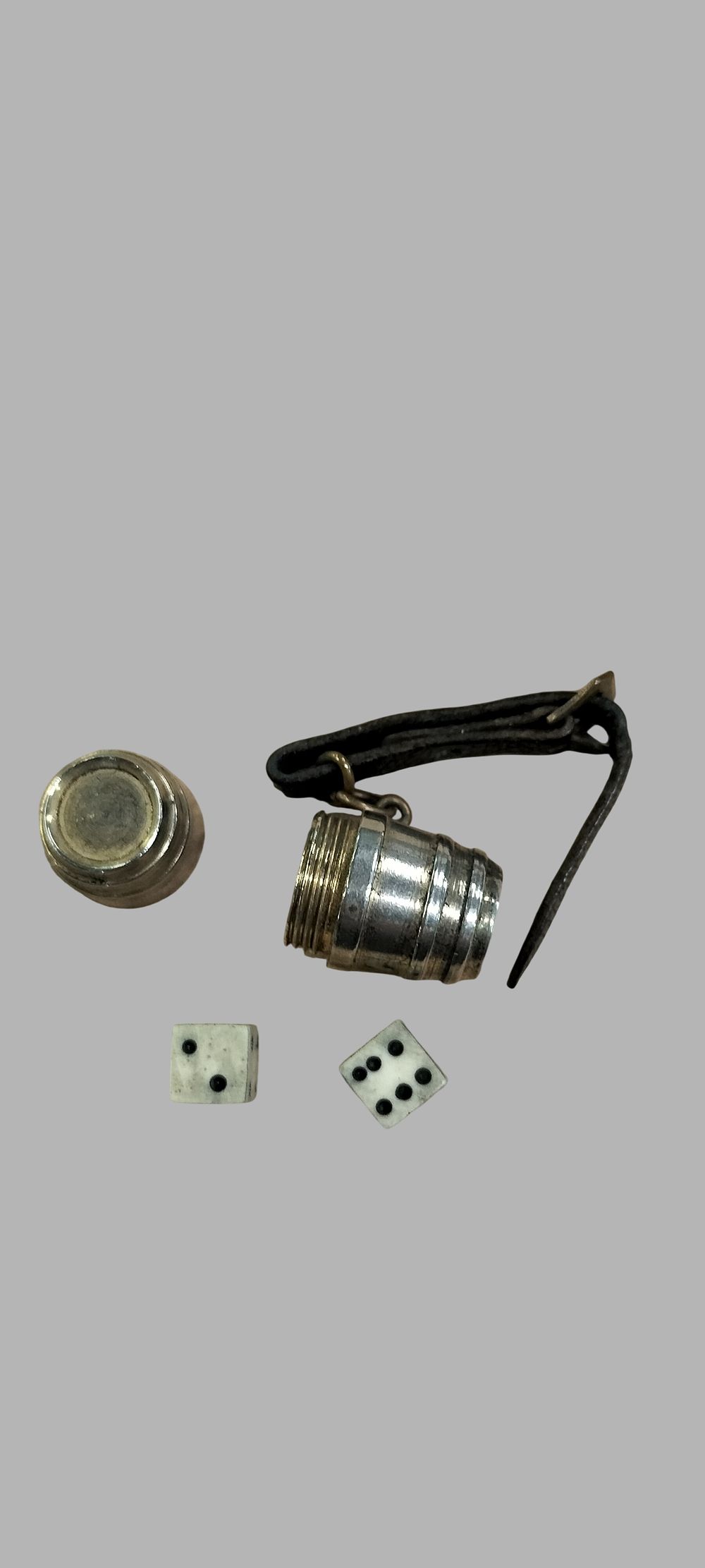 Lot 397: A Pair of Miniature Dice in a Barrel Fob with Strap