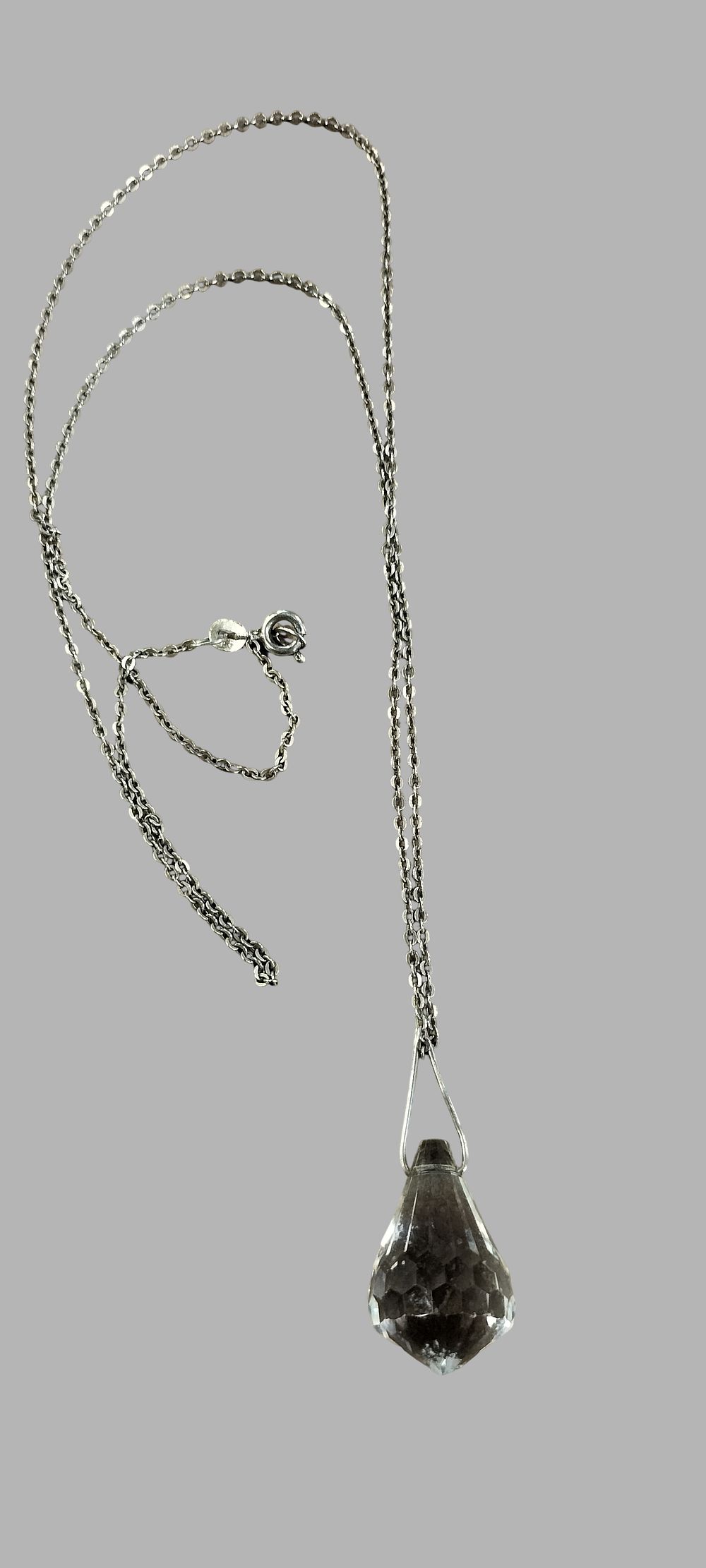Lot 409: A sterling silver and faceted clear crystal briolette pendant necklace