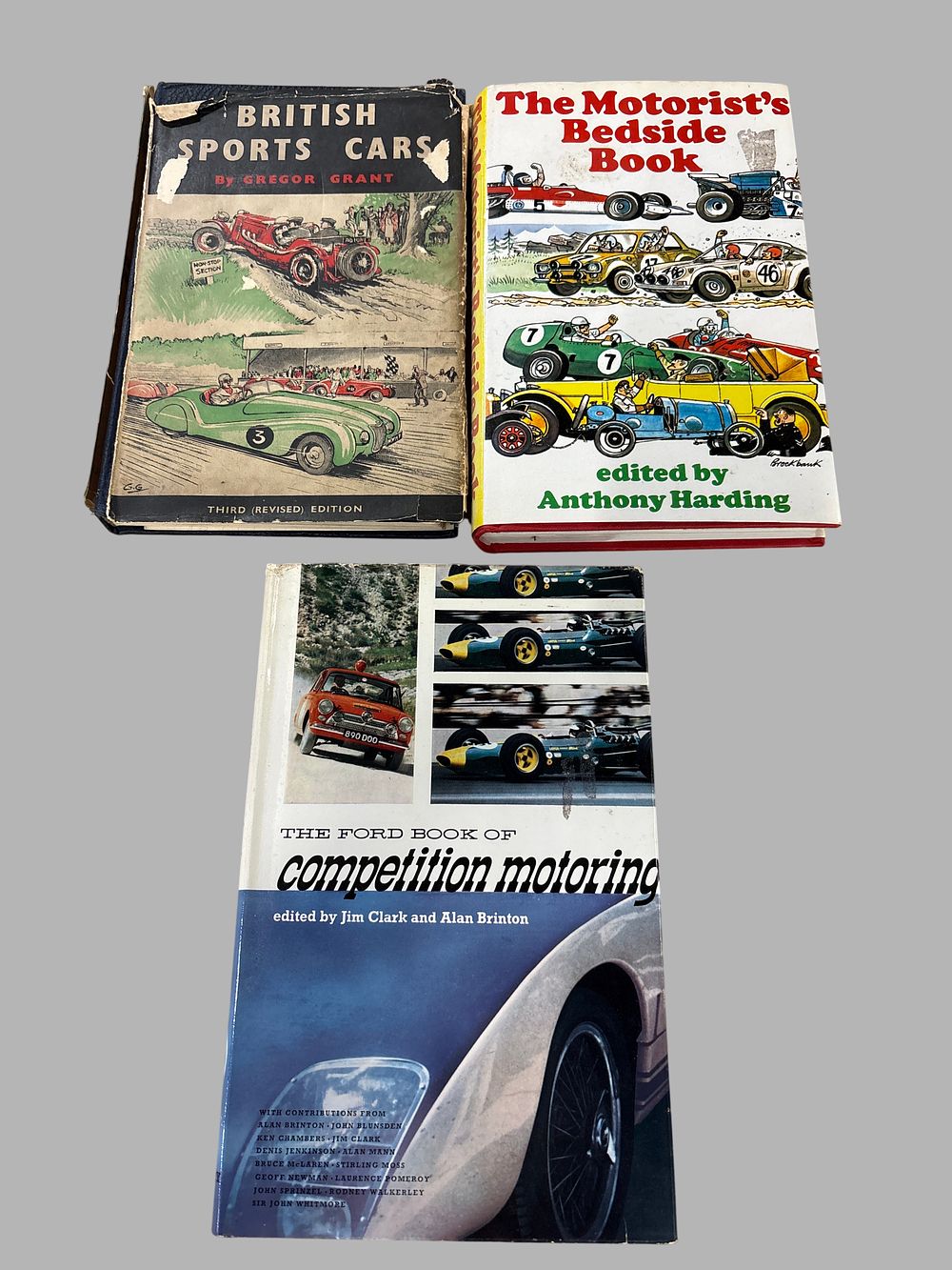 Lot 423: A Trio of Vintage Motoring and Motor Racing Hardcover Books with Dust Jackets