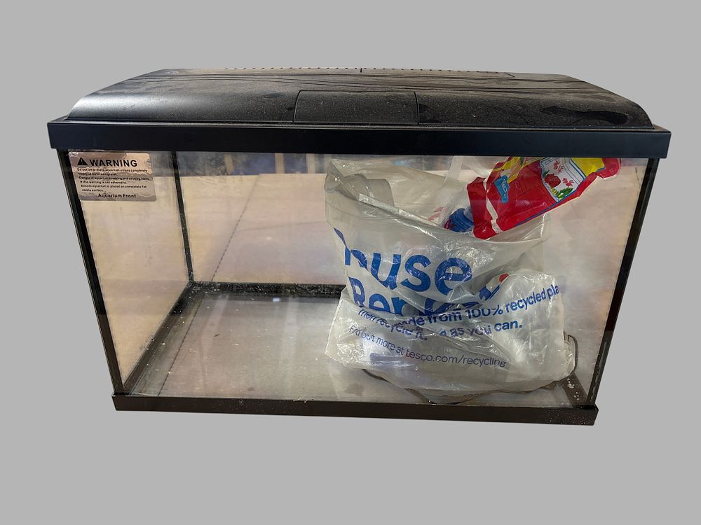 Lot 435: An Aquarium Starter Kit with Integrated Hood and An Assortment of Accessories