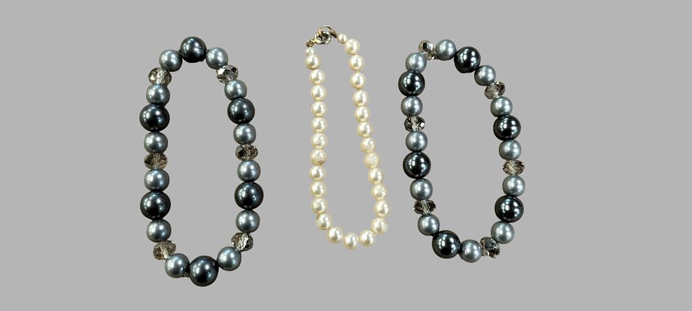 Lot 443: A Trio of Faux Pearl and Glass Bead Costume Jewellery Bracelets