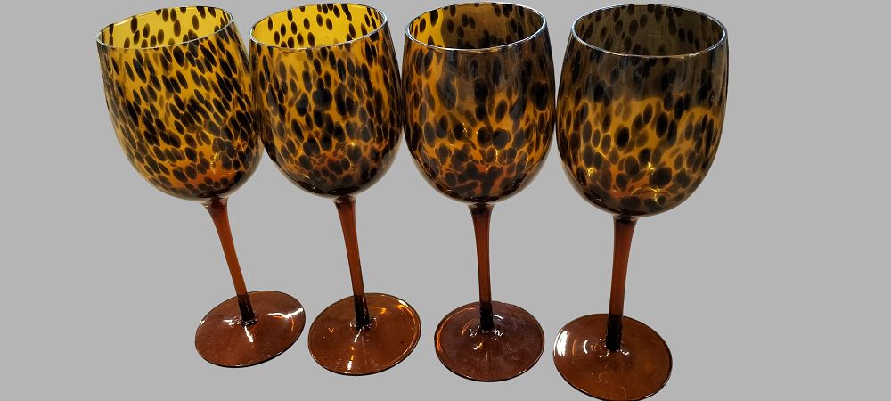Lot 472: A Set of Four Hand-Blown Leopard Pattern Glass Wine Glasses