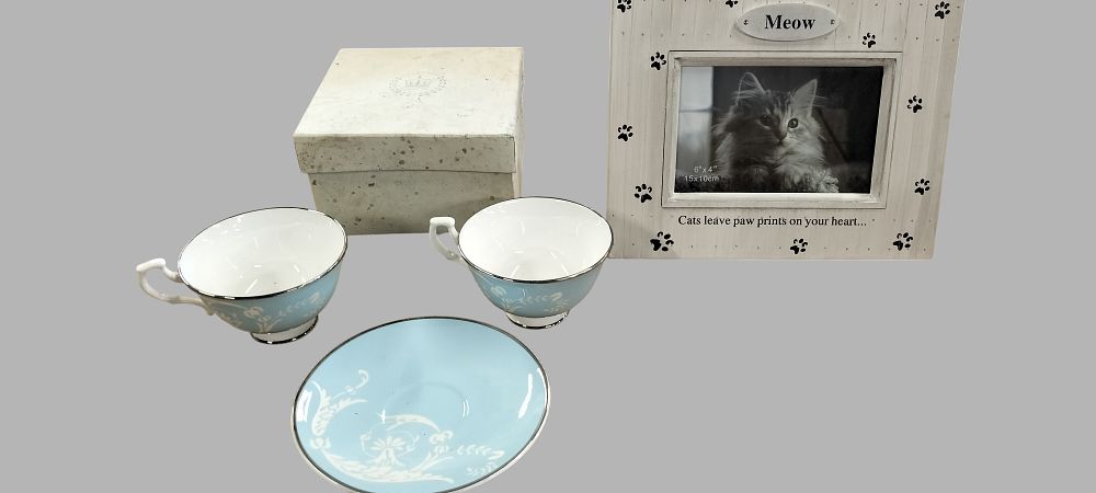 Lot 477: A Collection of Royal Collection Clarence House Fine Bone China and a Cat Themed Photo Frame