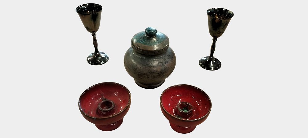 Lot 486: An Assortment of Decorative Items including a Pair of Silver Plated Goblets a Lidded Studio Pottery Jar and a Pair of Red Glazed Cup Stands