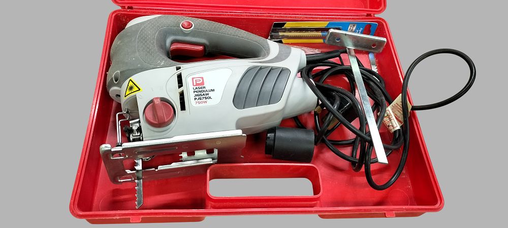 Lot 170: Performance Power PJS750L 750W Corded Pendulum Jigsaw with Laser Guide and Accessories