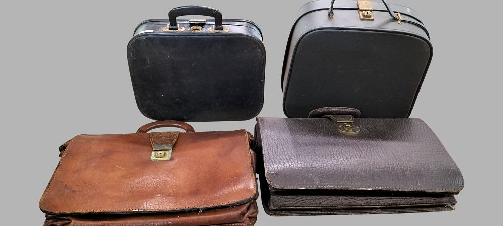 Lot 176: A Group of Four Mid-20th Century Vintage Leather and Synthetic Cases