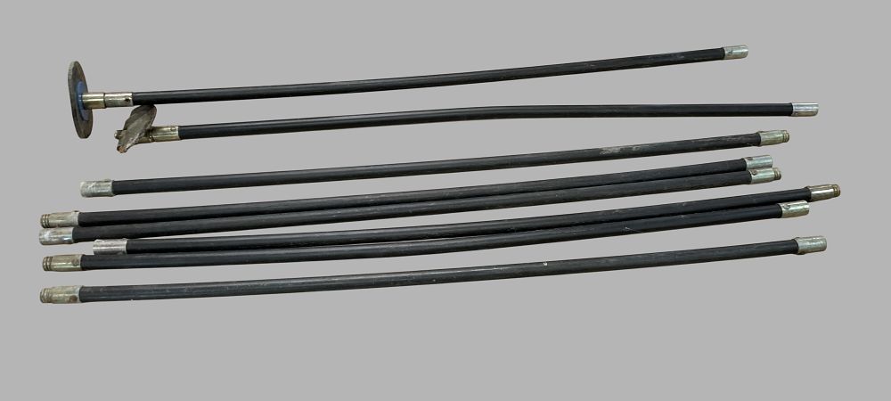 Lot 183: A Set of Flexible Drain Cleaning Rods and Attachments