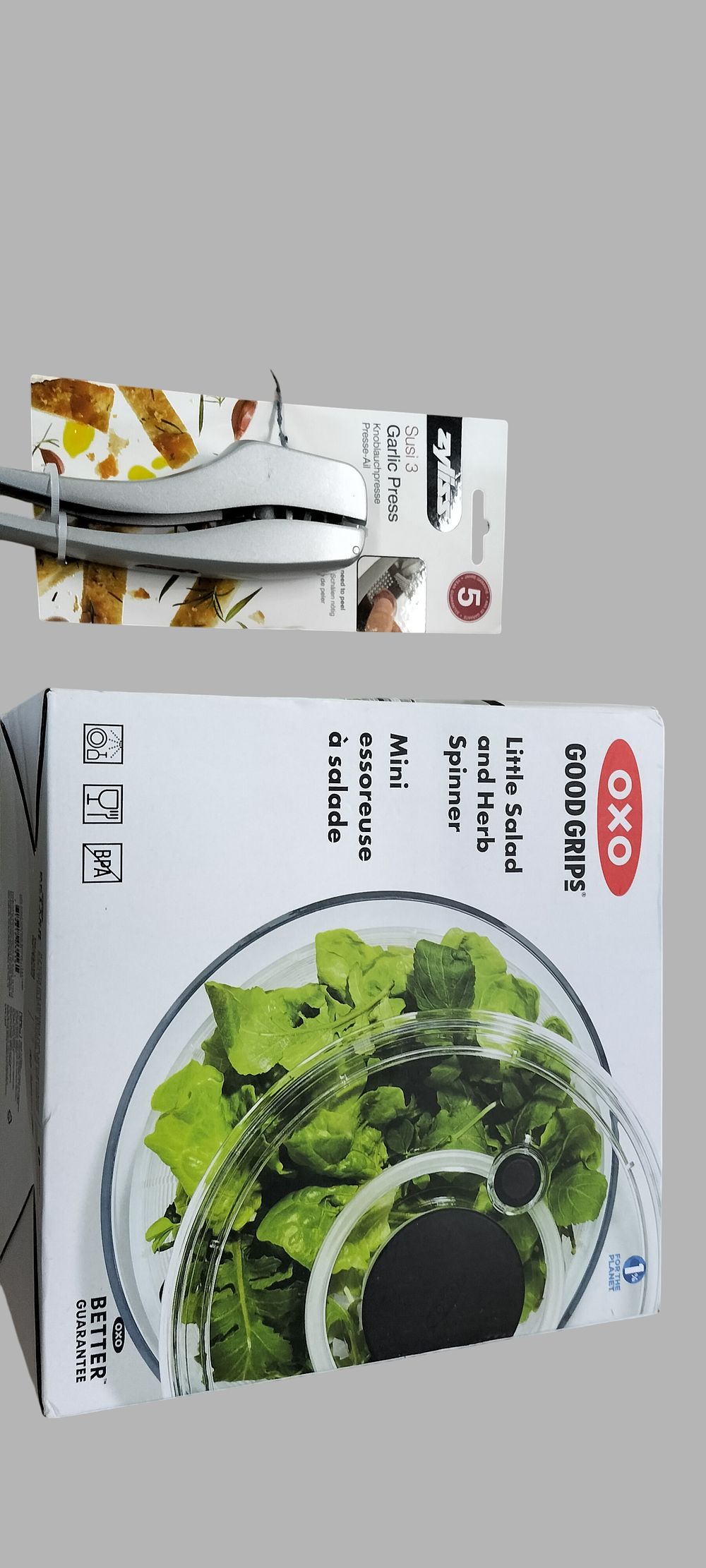 Lot 204: Two Kitchen Tools Comprising an OXO Good Grips Little Salad and Herb Spinner and a Zyliss Susi 3 Garlic Press