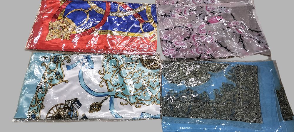 Lot 215: An Assortment of Patterned Satin and Chiffon Style Fashion Scarves