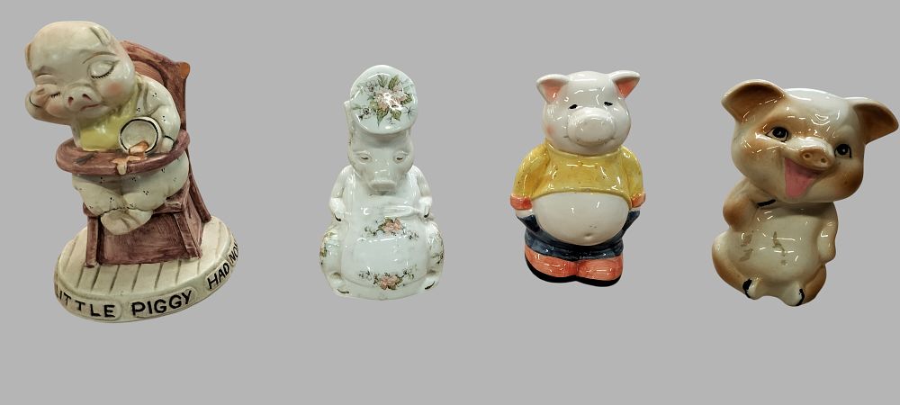 Lot 222: A Collection of Vintage and Contemporary Ceramic Piggy Banks including a Shawnee Pottery Smiley Pig