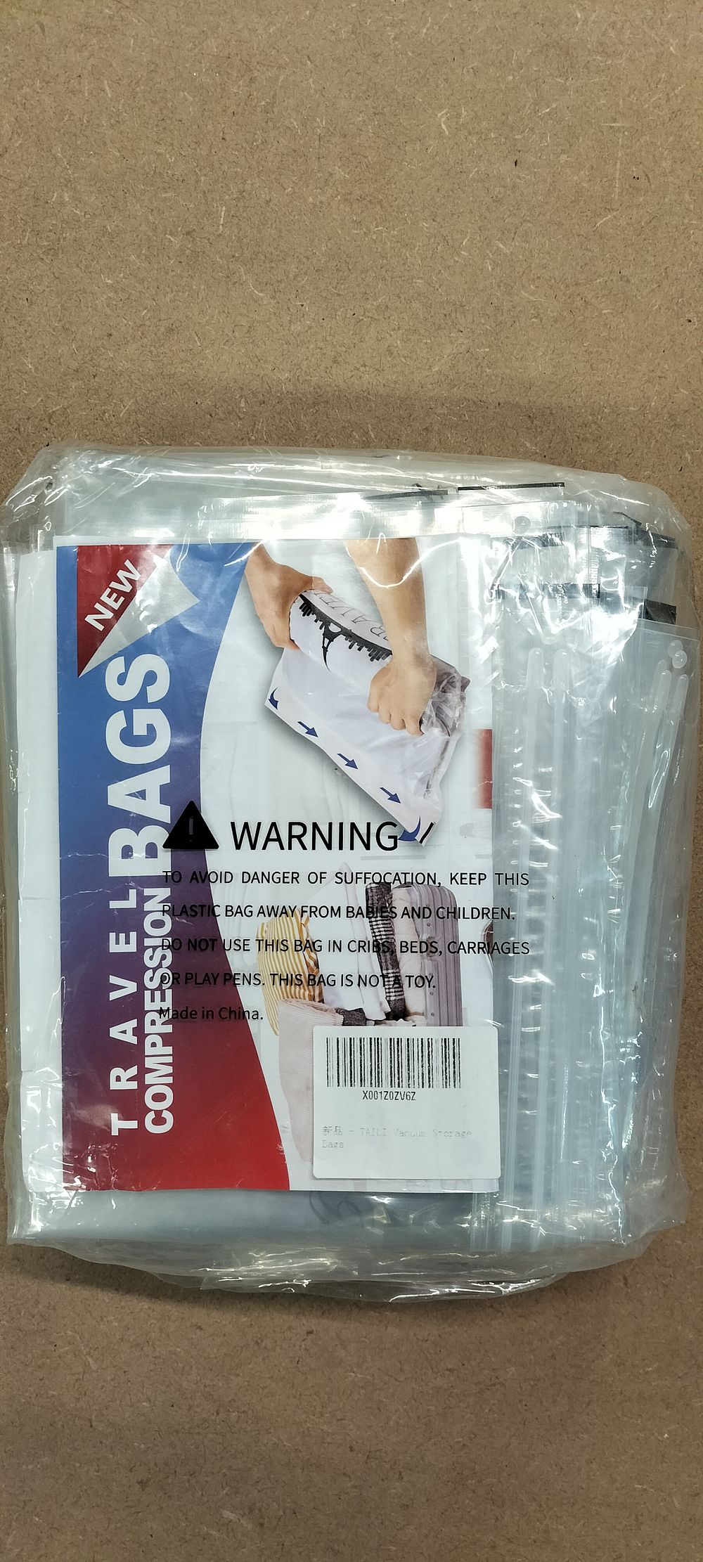 Lot 236: A Collection of TAILI Travel Compression Vacuum Storage Bags
