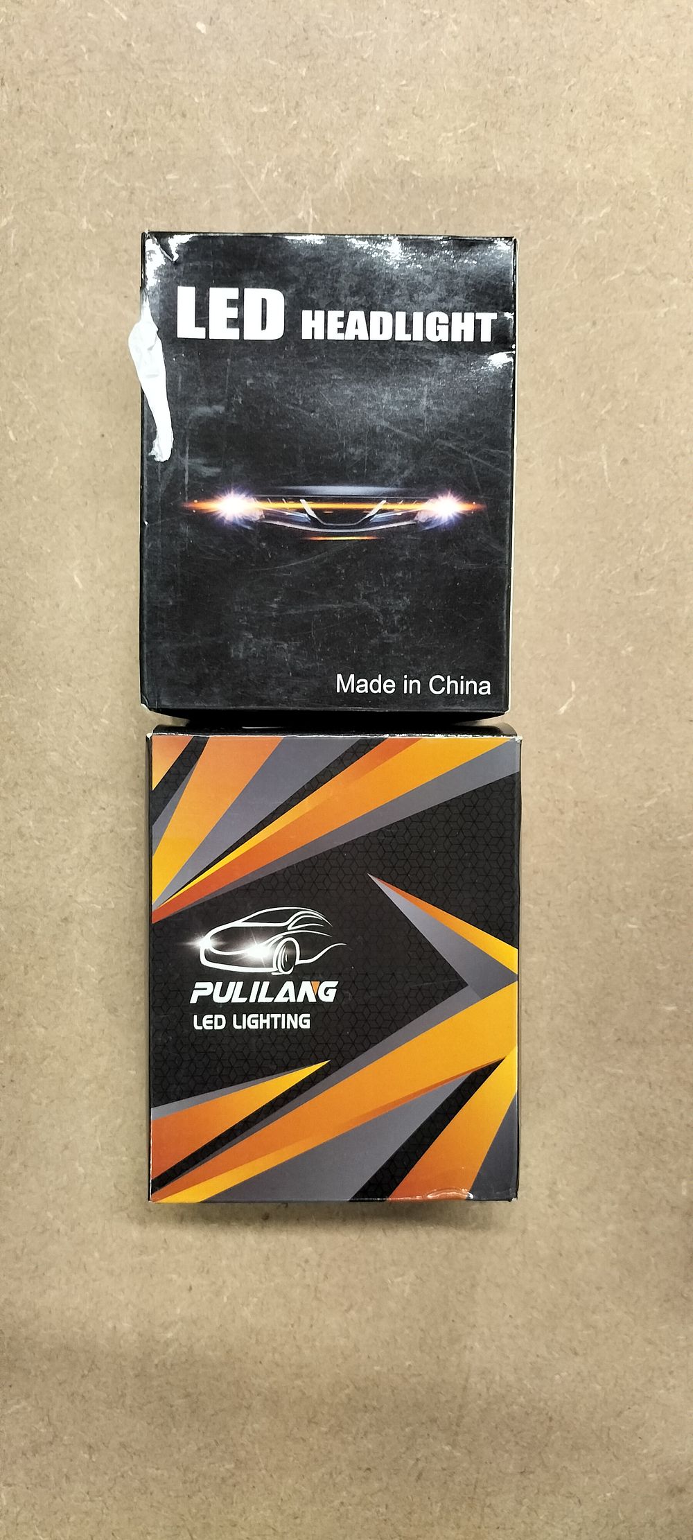 Lot 238: Two Pulilang LED Headlight Conversion Bulb Kits, H3 and H7