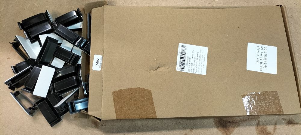 Lot 269: A Set of 60 DAJMAIEZ Large Black Self-Adhesive Wire Clamps Model ECDME-71