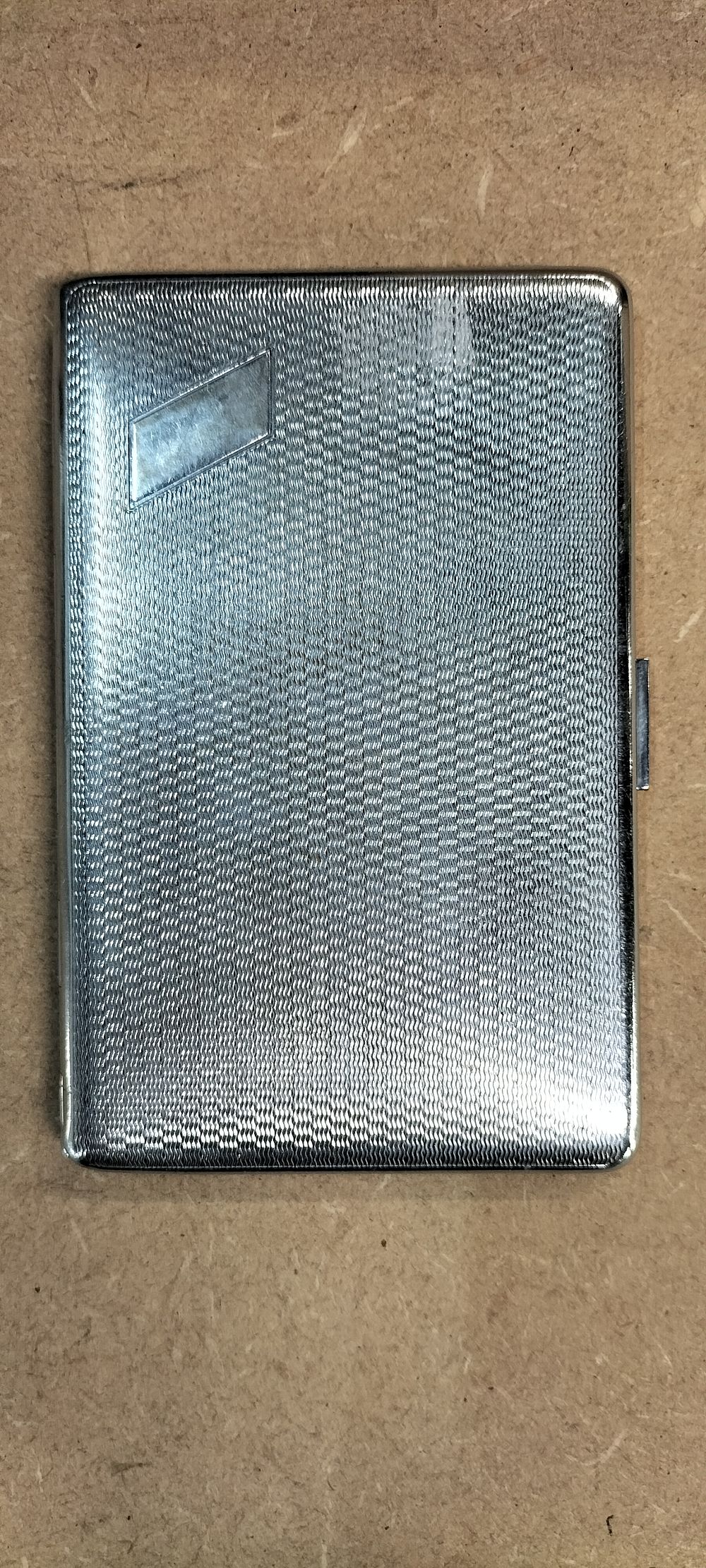 Lot 286: A Vintage Mar-Bro Engine-Turned Chrome-Plated Cigarette Case