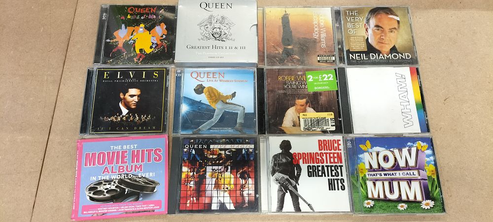 Lot 293: A Collection of 12 Pop and Rock Compact Disc Albums