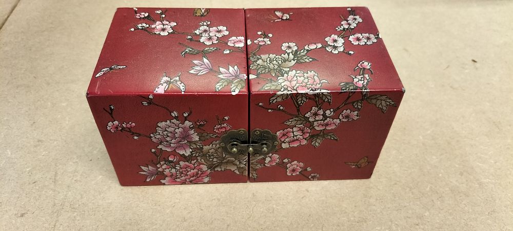 Lot 295: A Chinese Style Red Faux Leather Four Drawer Jewellery Box