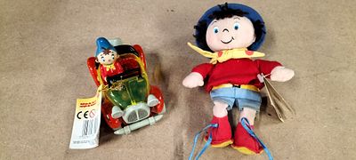 A Pair of Enid Blyton Original Noddy Collectibles Comprising a Plush Doll and a Candy Container Car