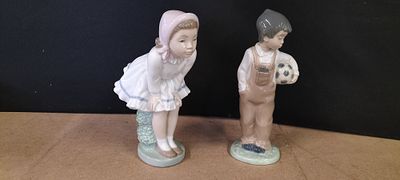 Two NAO by Lladr&oacute; Porcelain Figurines including Wanna Play Boy with Football