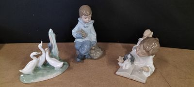 A Trio of NAO by Lladr&oacute; Glazed Porcelain Figurines