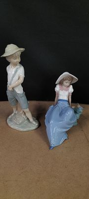 A Pair of Nao by Lladro Glazed Porcelain Childhood Figurines