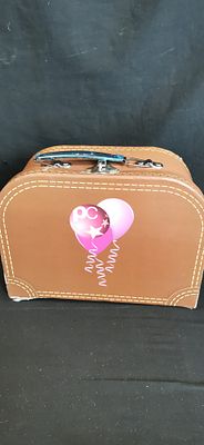An Avon 125th Anniversary Commemorative Stitched Board Carry Case