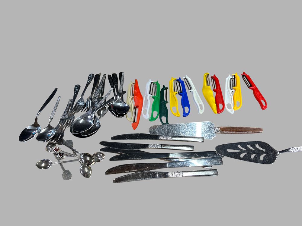 Lot 172: An Assortment of Viners Love Story Stainless Steel Flatware Serving Utensils and Vegetable Peelers