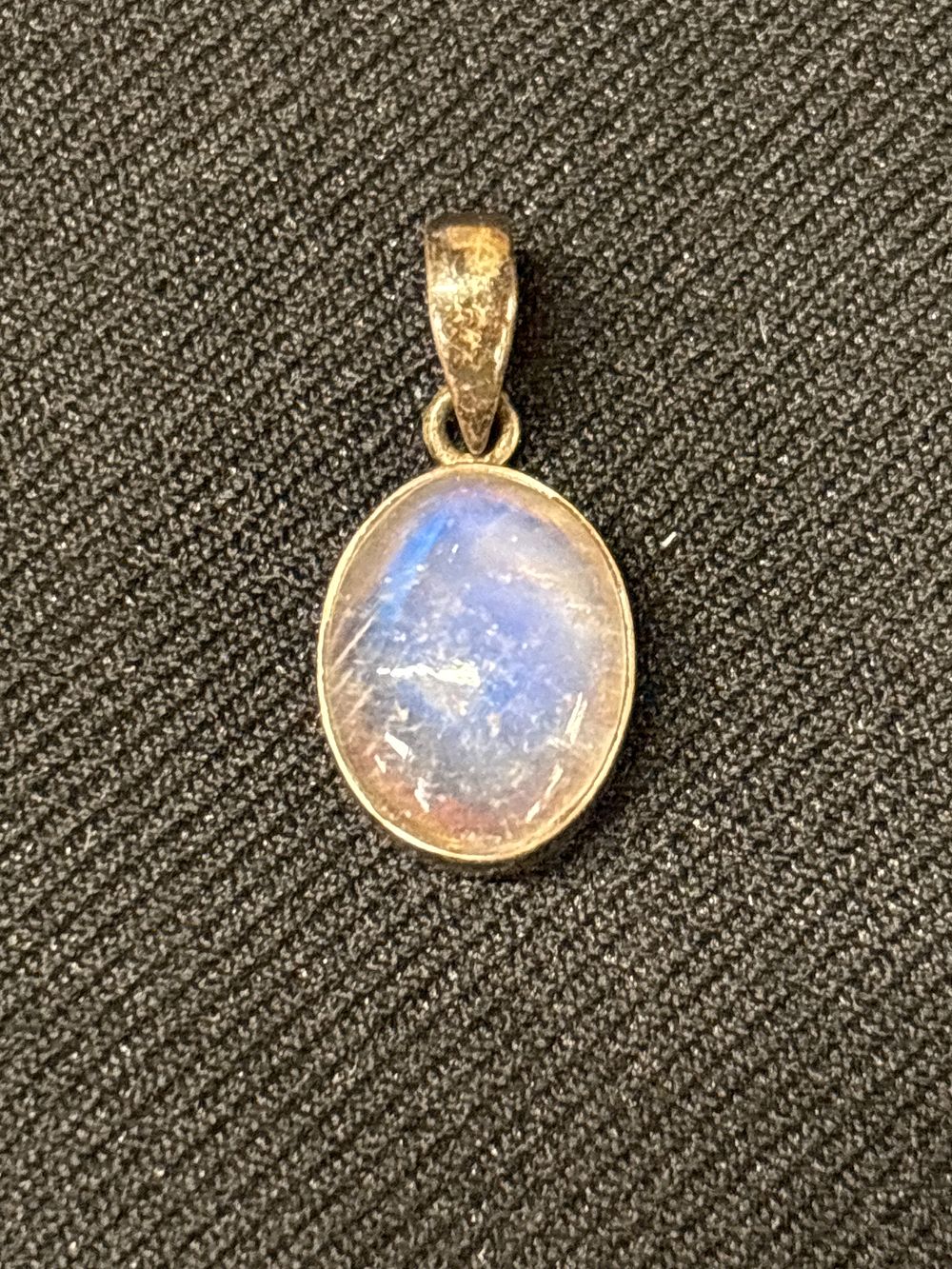 Lot 352: A Sterling Silver and Moonstone Pendant