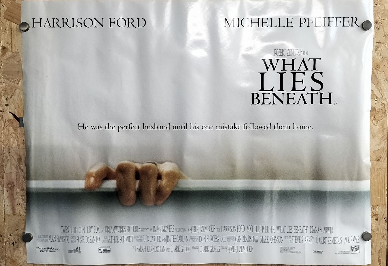 An original theatrical movie poster for the 2000 film What Lies Beneath distributed by Twentieth Century Fox