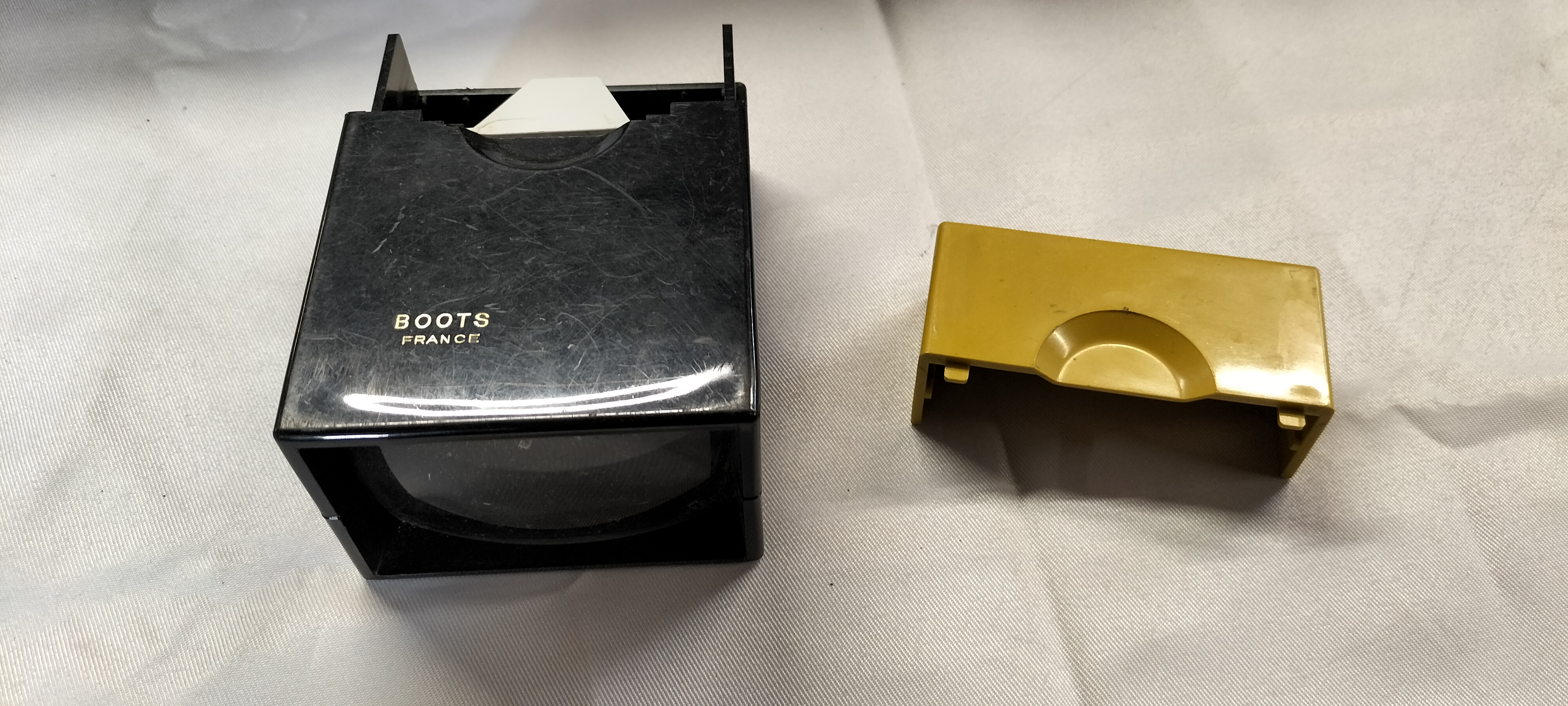 A Vintage Boots France Plastic Handheld Slide Viewer
