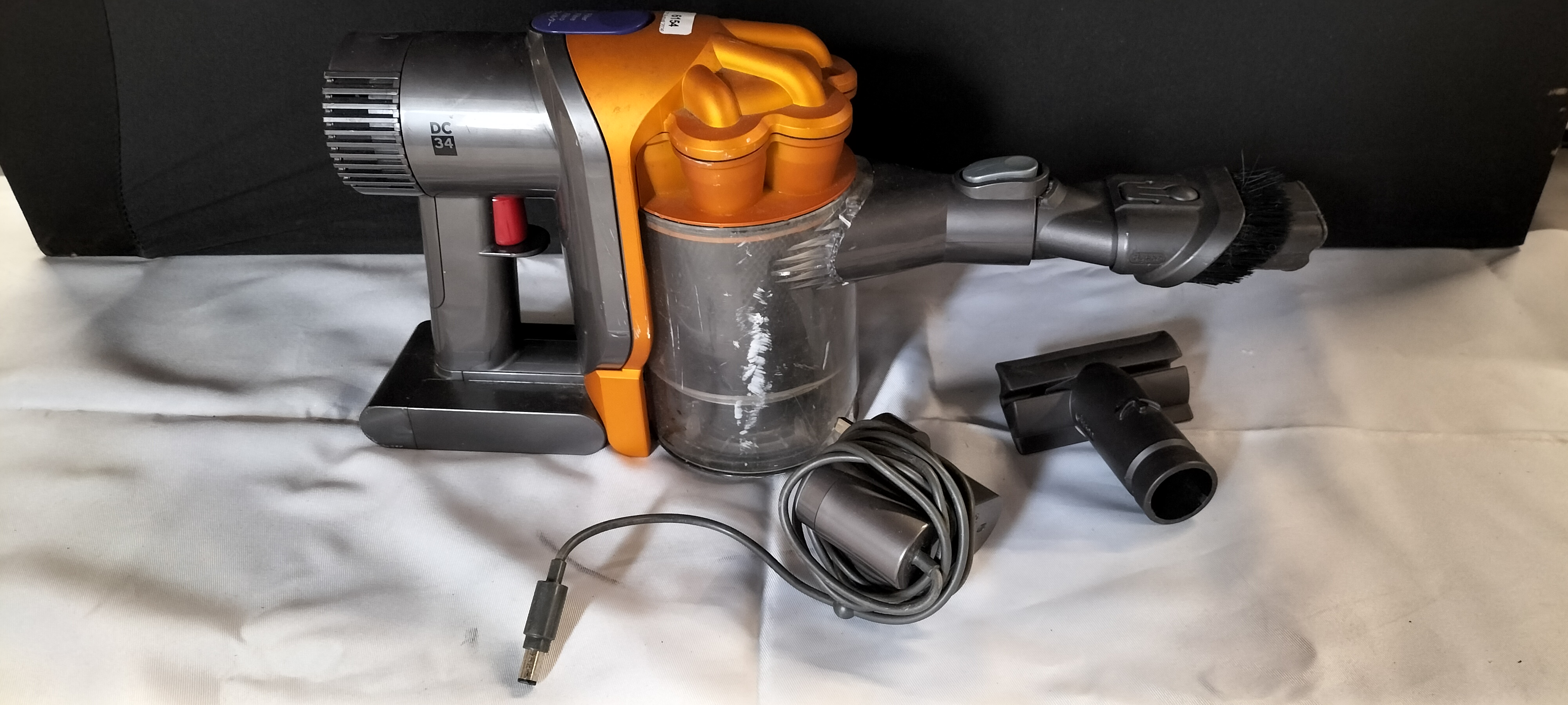 A Dyson DC34 Cordless Handheld Vacuum Cleaner