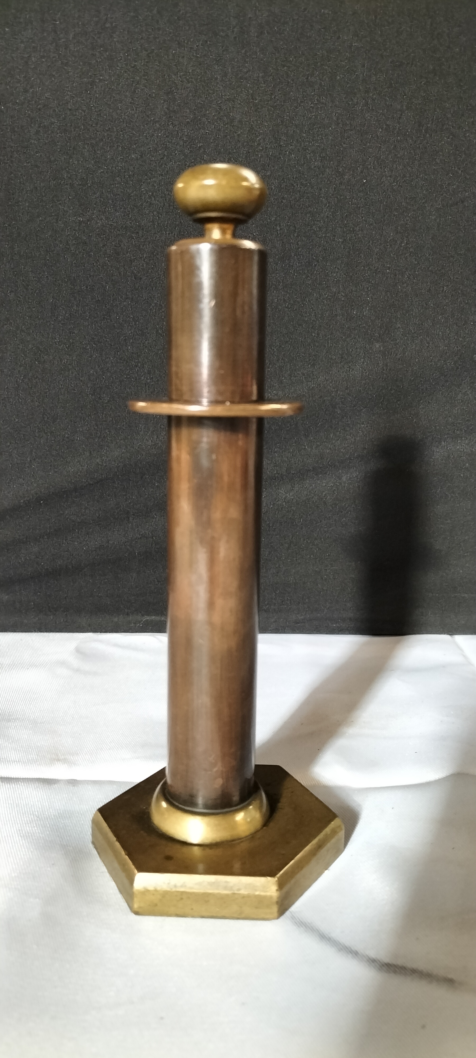 A Vintage Columnar Form Copper and Brass Petrol Table Lighter