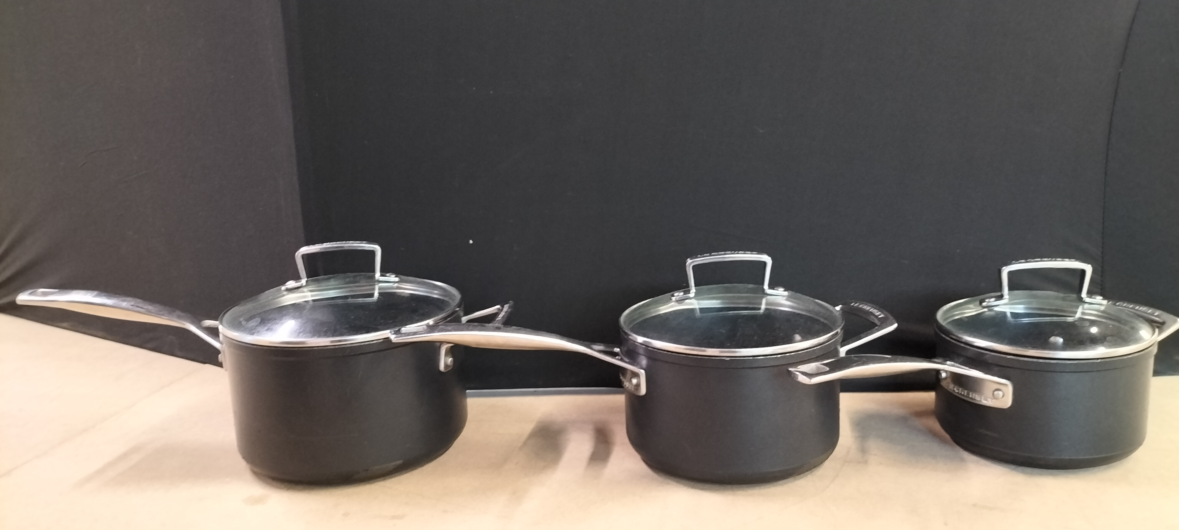 3 Le Creuset Hard-Anodized Aluminium Saucepans with Glass Lids, H19049