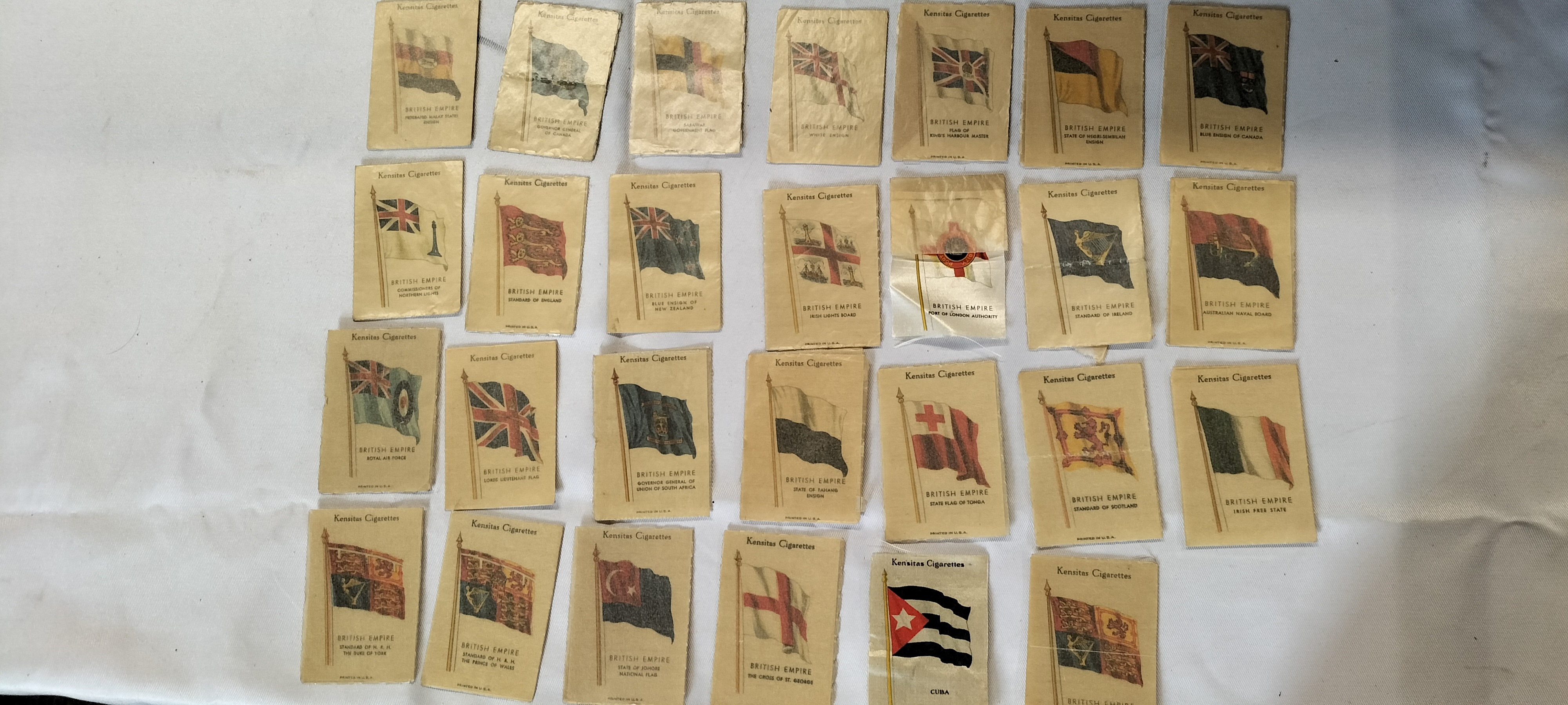 A Collection of Vintage Kensitas Cigarettes Silk Flags of the British Empire Trade Cards