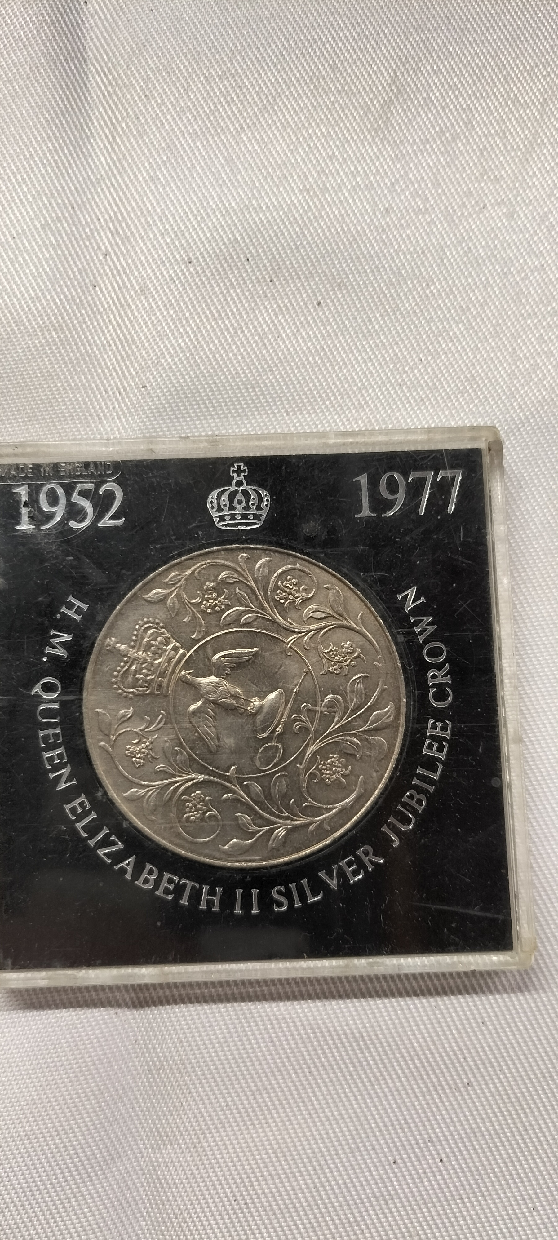 A 1977 Silver Toned Silver Jubilee Crown Coin in National Westminster Bank Limited Packaging