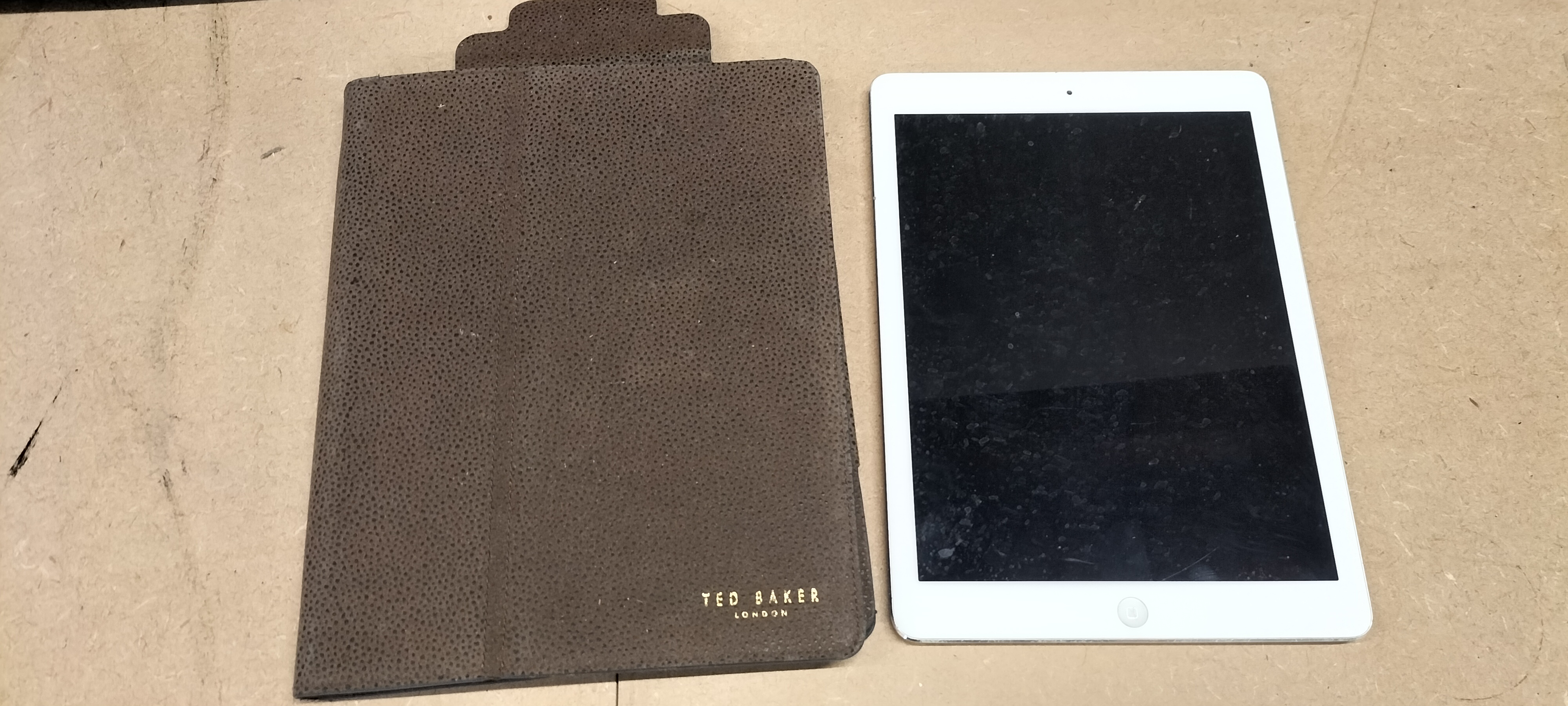 An Apple iPad Air MD788B/B 16GB Tablet and Ted Baker Folio Case