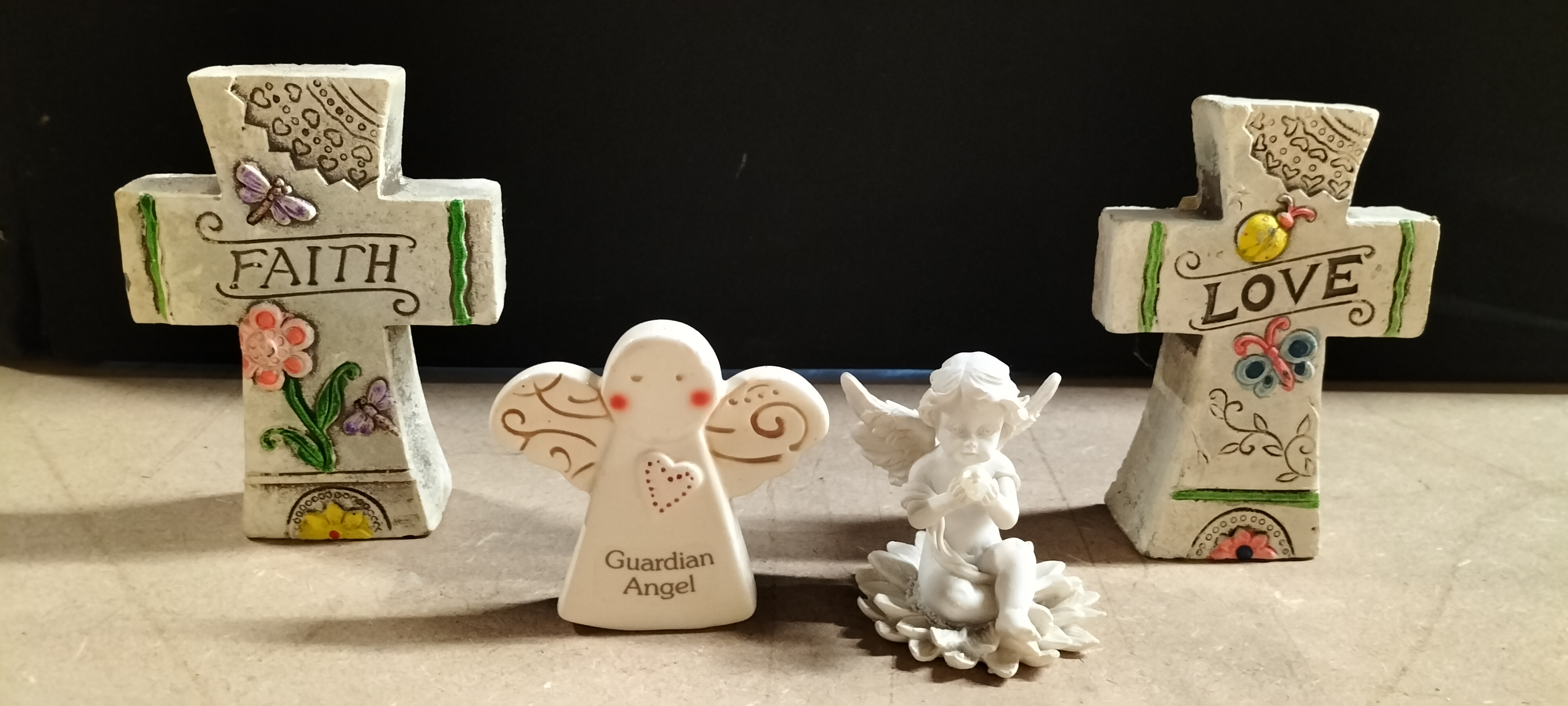 A Collection of 4 P M S Resin and Ceramic Religious Figurines