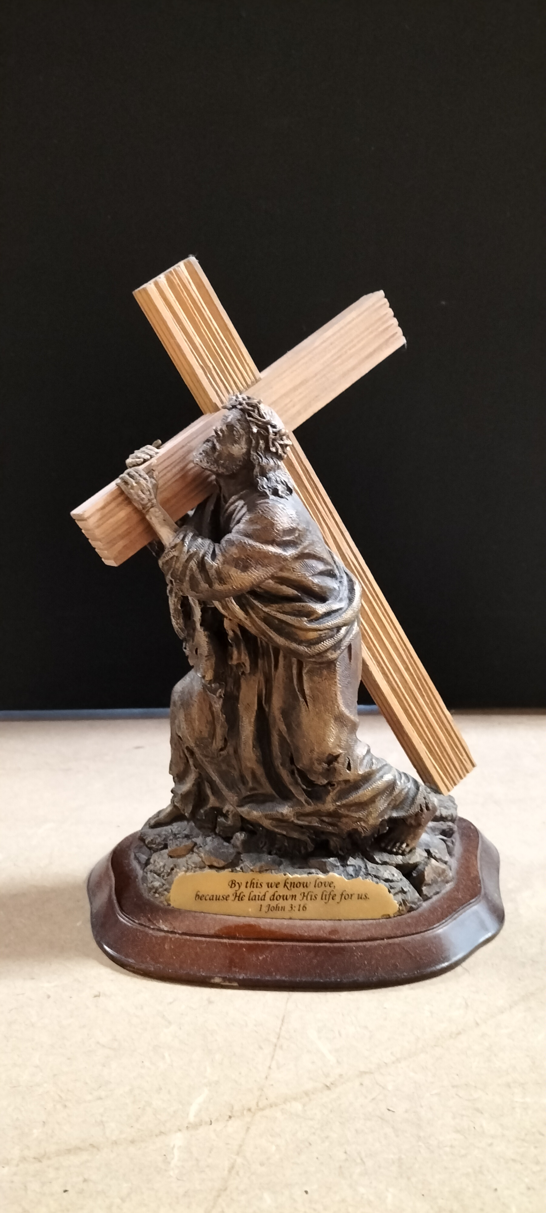 A Bronzed Composite Figurine of Jesus Carrying the Cross