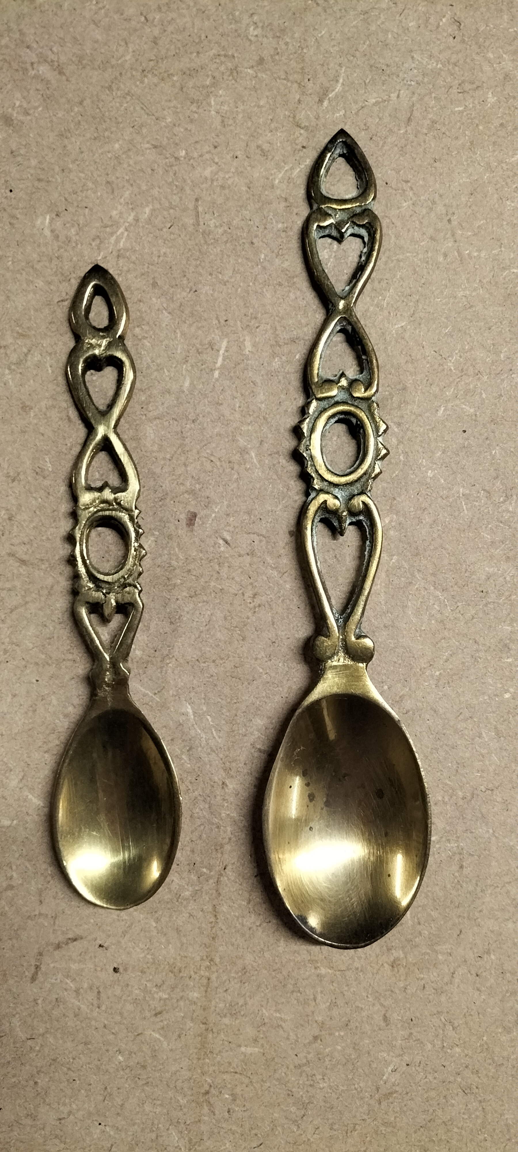 2 Vintage Graduated Size Cast Brass Welsh Love Style Spoons