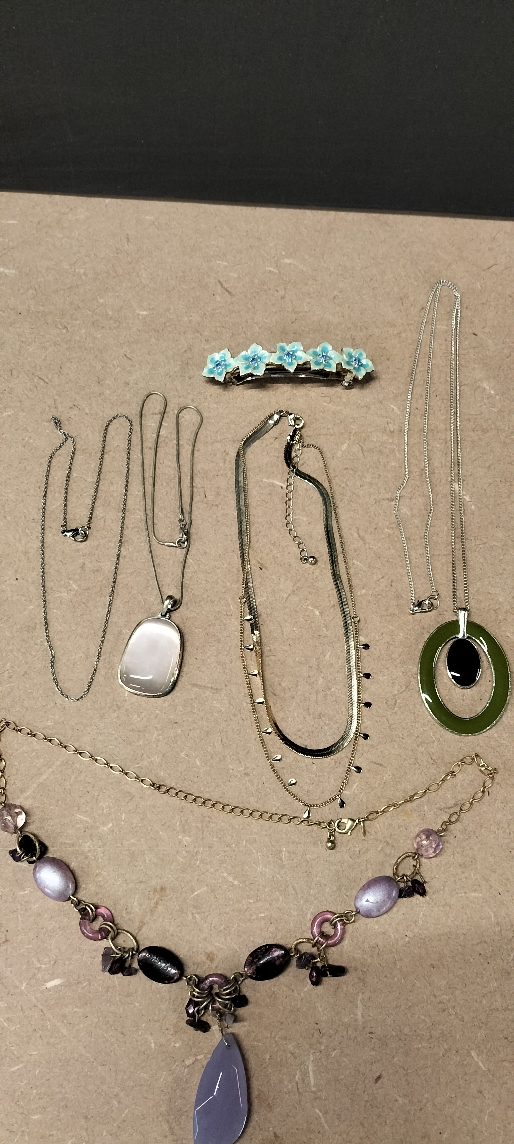 A Collection of  Metal and Enamel Costume Jewellery Items and a Floral Barrette