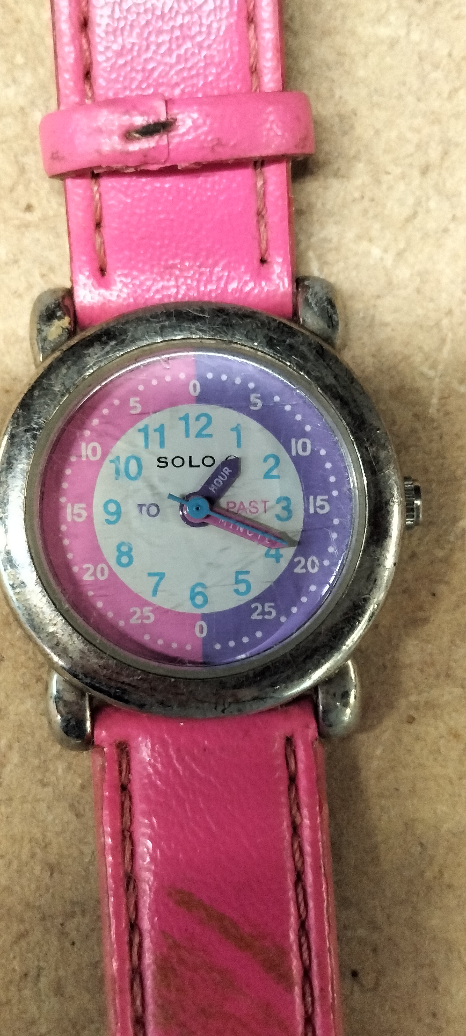 A Solo 27mm Teach the Time Base Metal and Stainless Steel Quartz Wristwatch