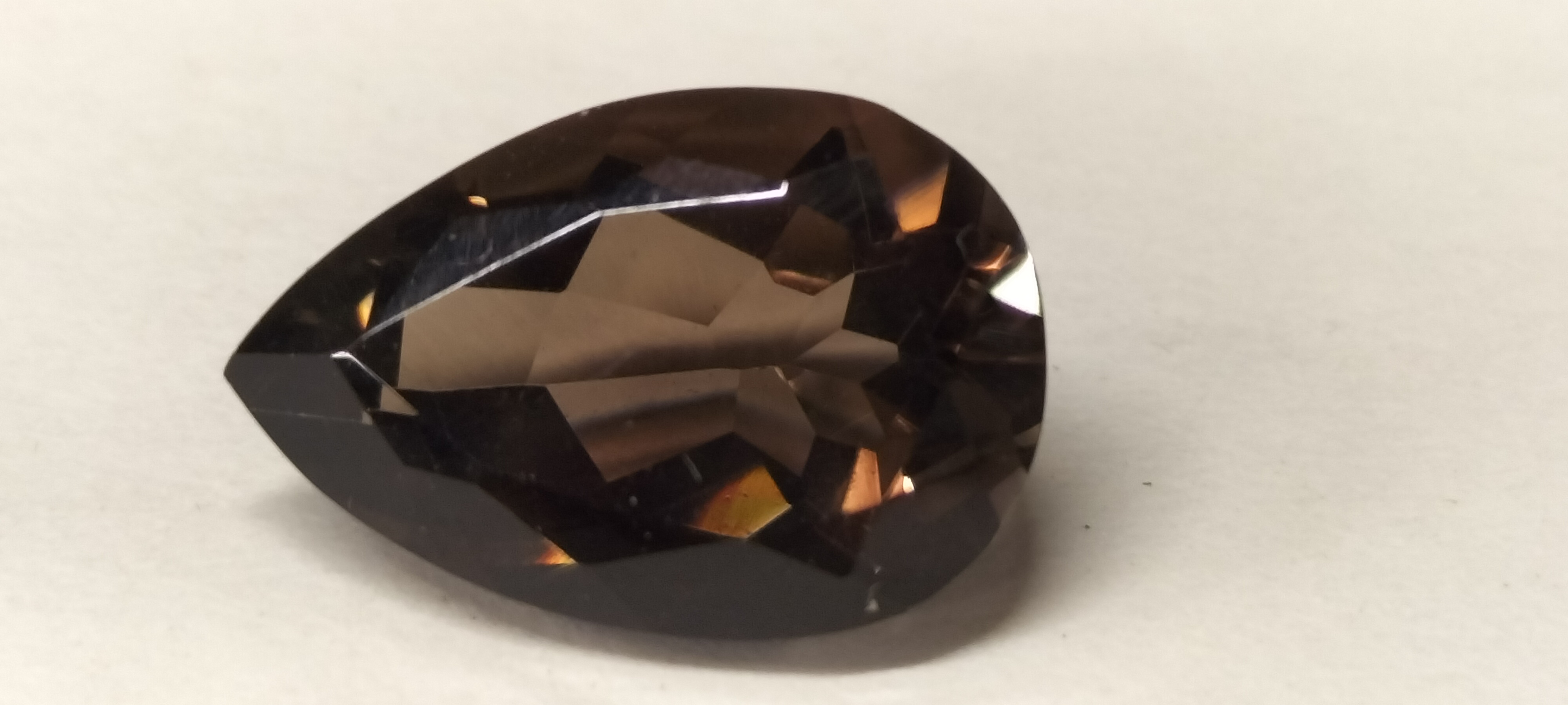 A 5.50ct Faceted Chocolate Topaz Pear Cut Gemstone