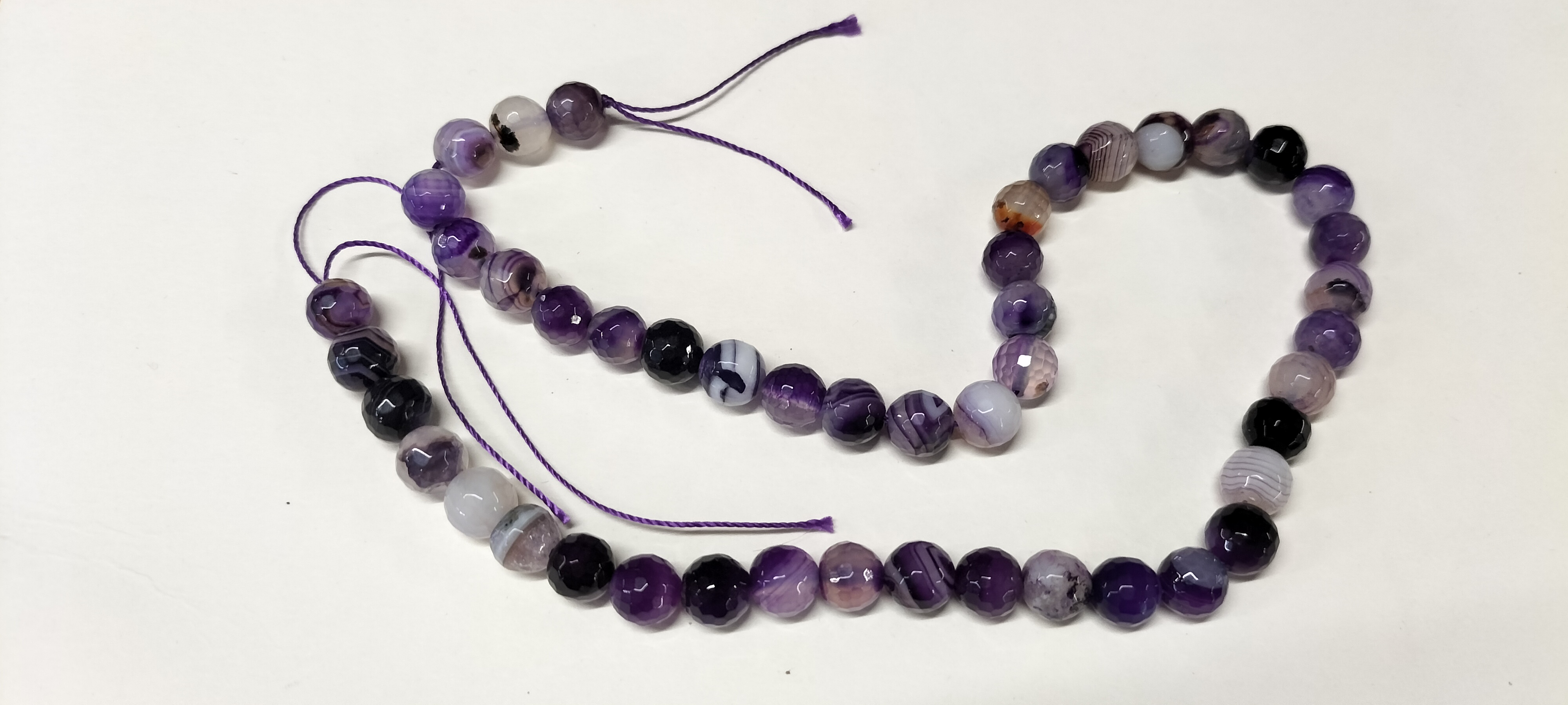 A Temporary Strand of 48 Faceted Amethyst Beads. 163.30ct