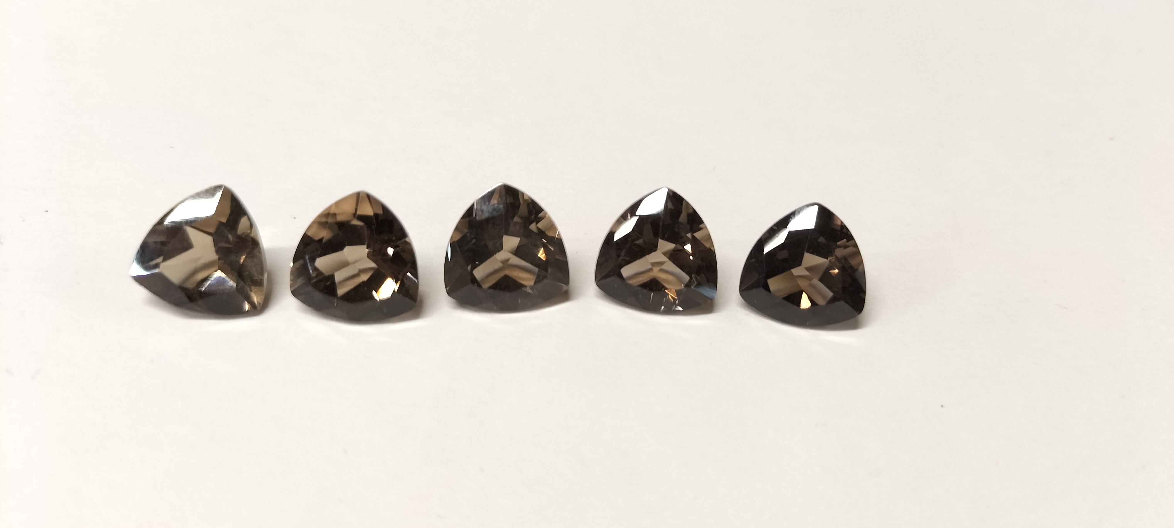 A Set of 5 Trilliant Cut Smoky Topaz Gemstones.16.10 ct
