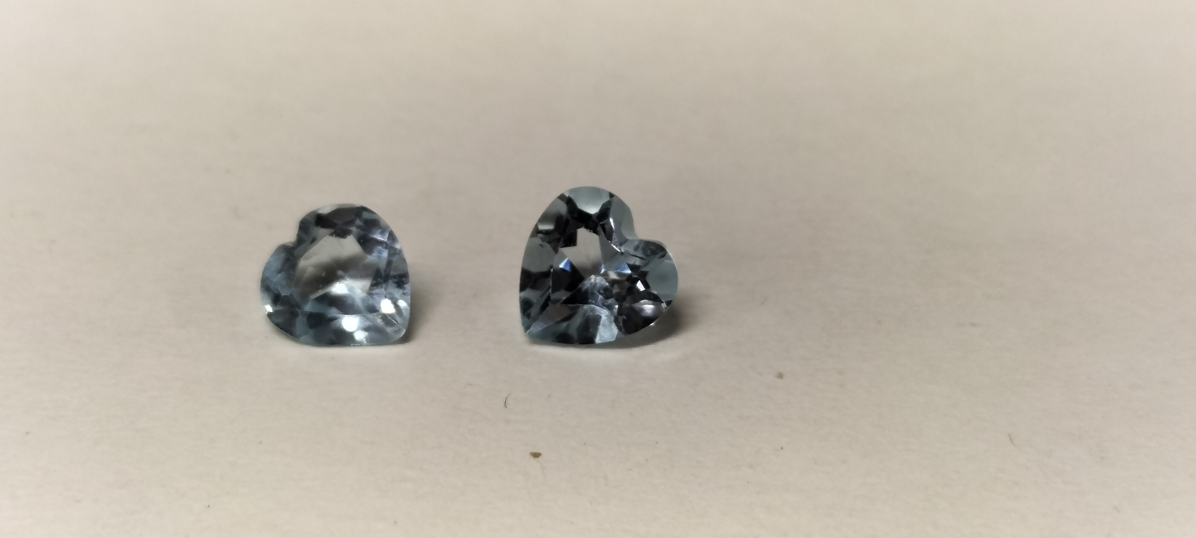 2 Heart Shaped Faceted Light Blue Topaz Gemstones. 1.10 ct