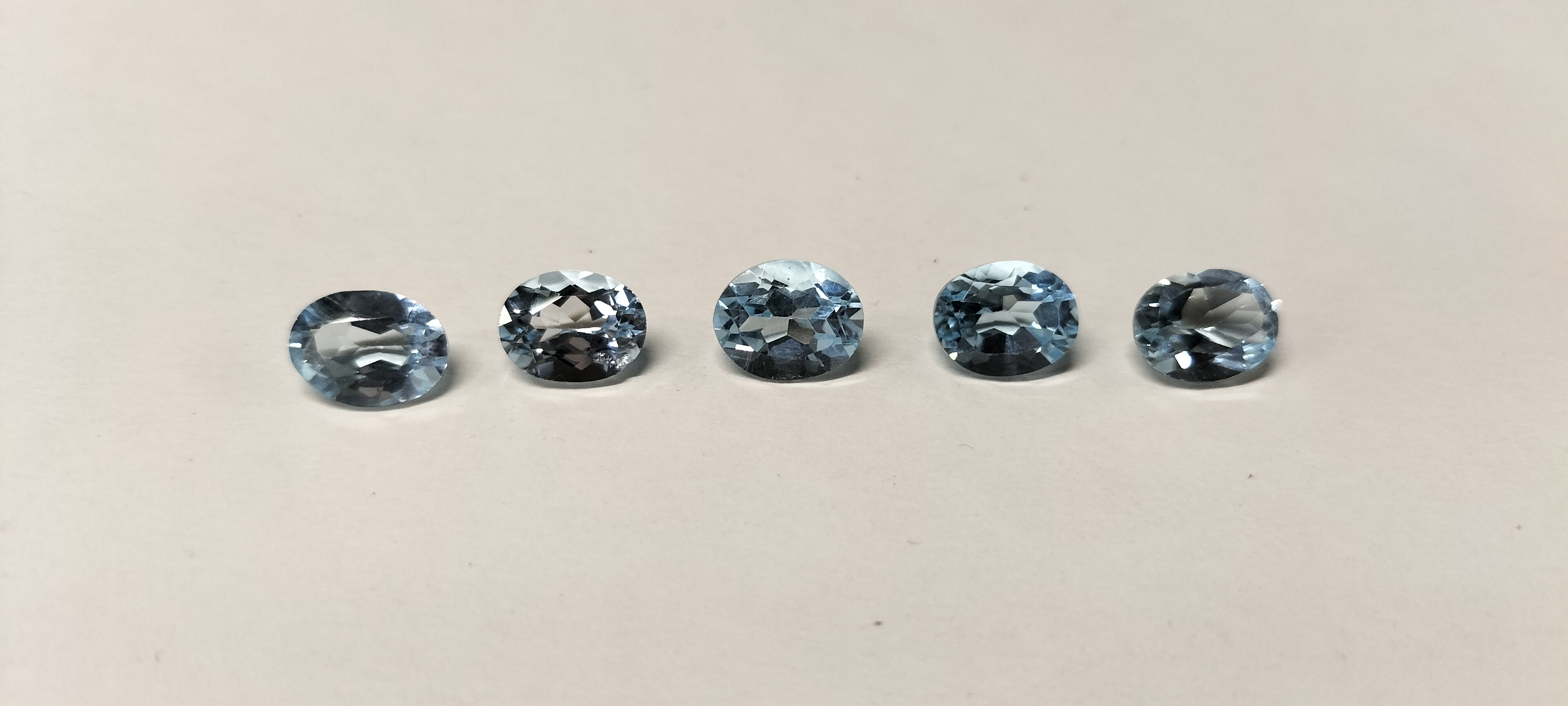 A Set of 5 Pale Blue Topaz Faceted Oval Gemstones. 11.80 ct