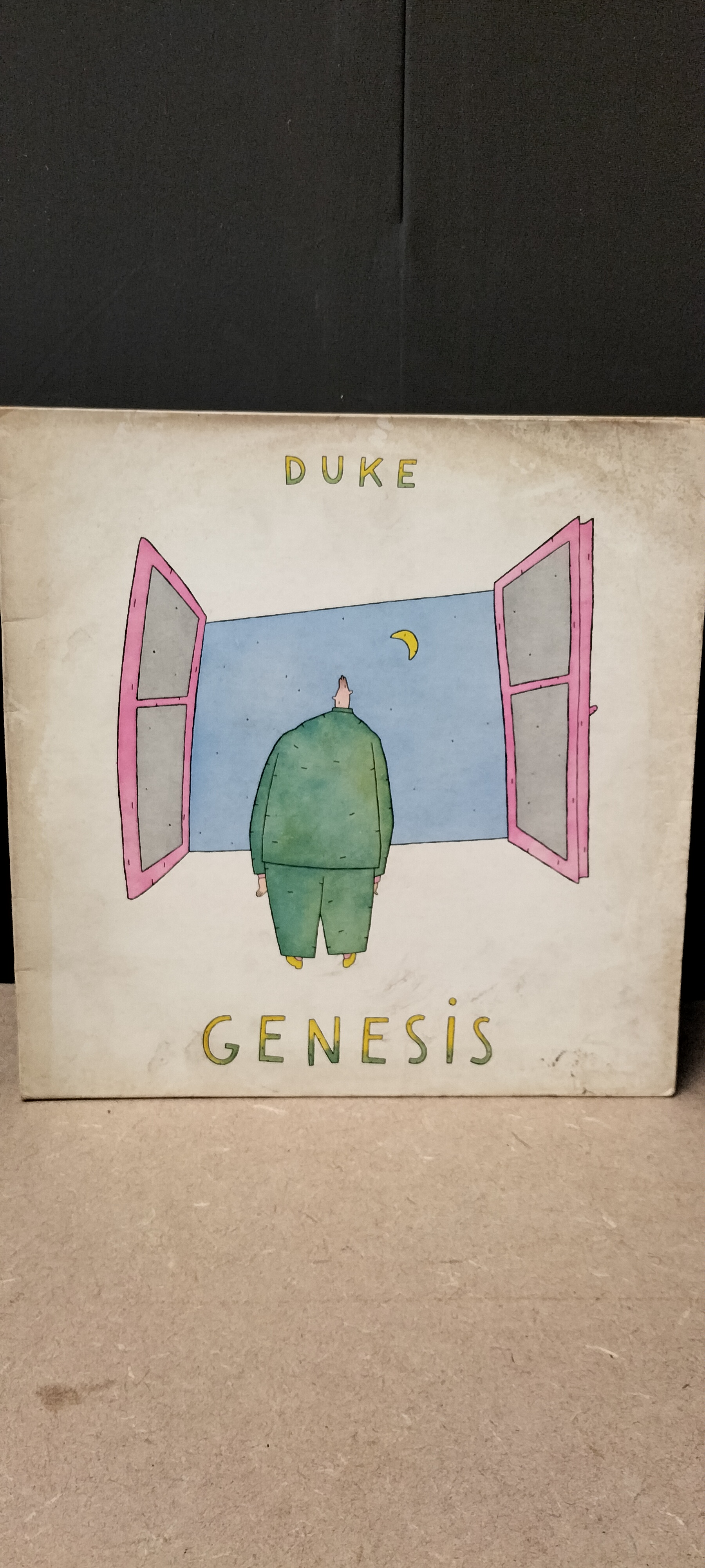 A Bob Dylan Planet Waves Vinyl LP and Genesis Duke Sleeve