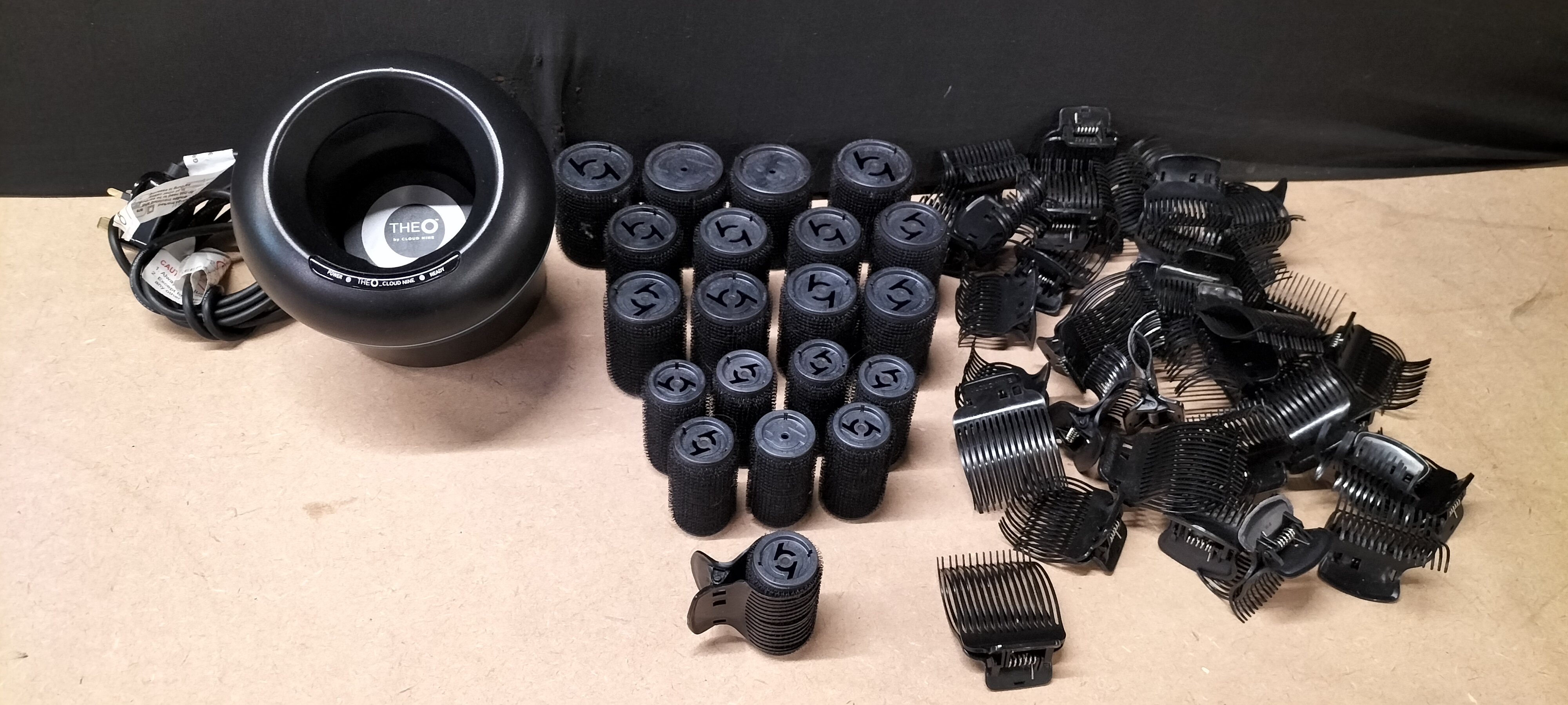 A Collection of Cloud Nine The O C9-IR1.0 Induction Hair Rollers and Clips