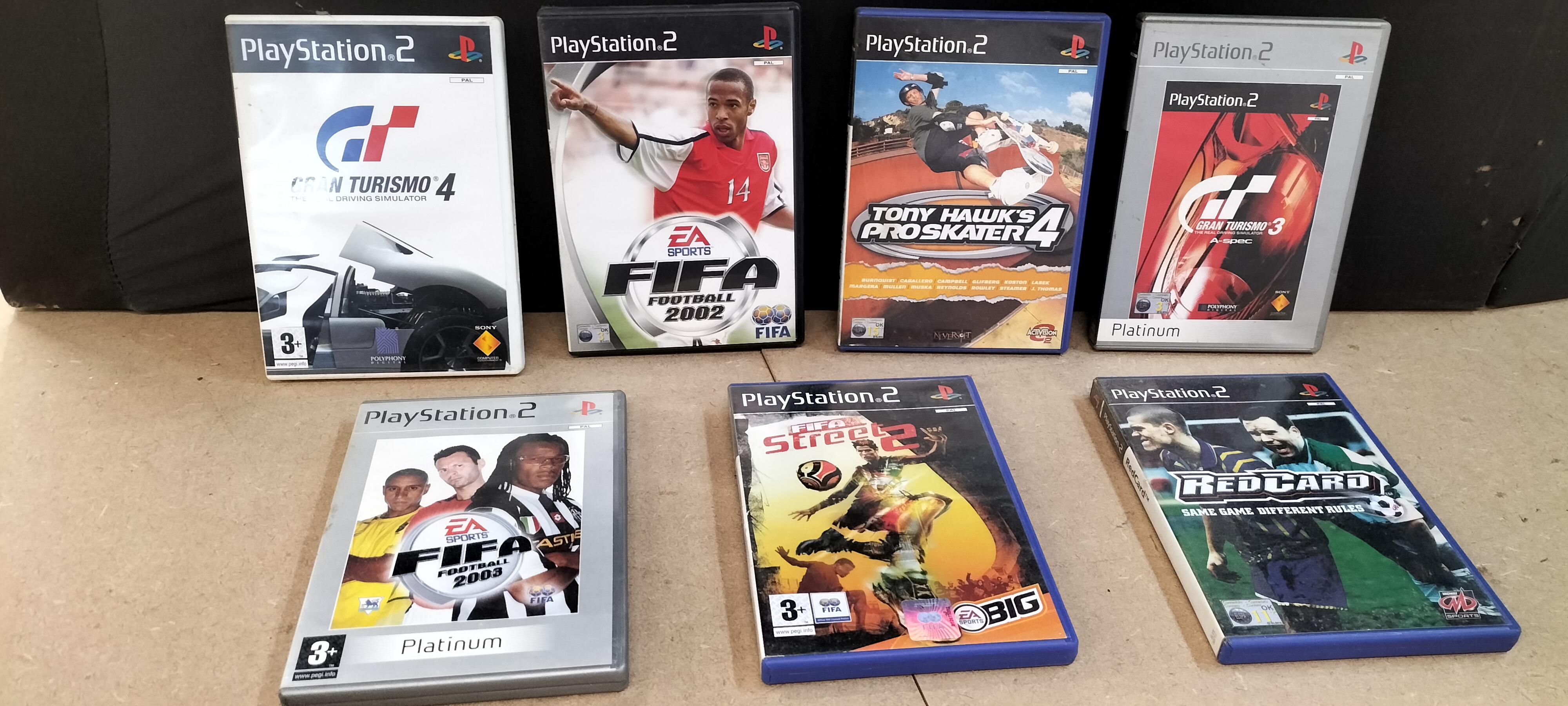 A Collection of 7 Sony PlayStation 2 Video Games Including Gran Turismo 4