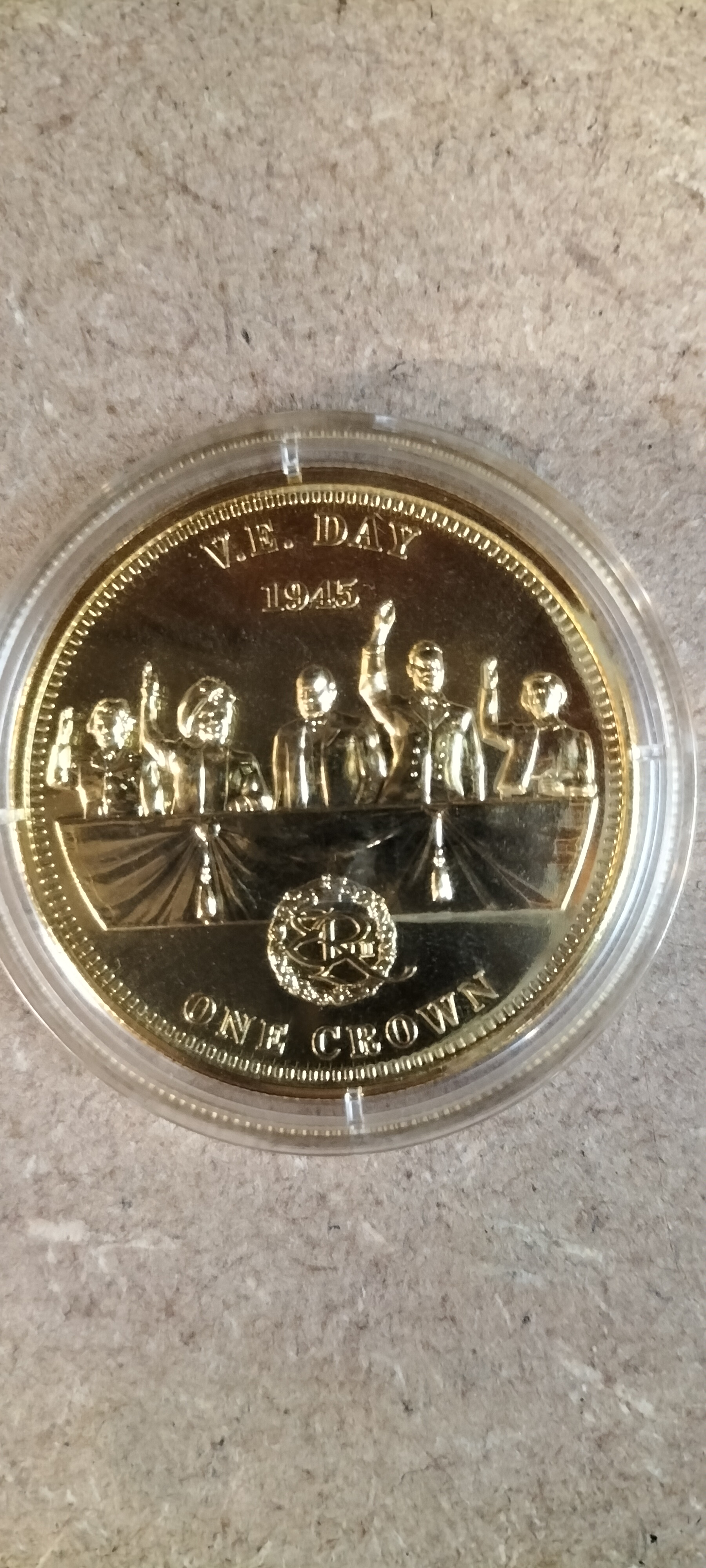 A 2010 TDC Gold-Plated V.E. Day Commemorative One Crown Coin
